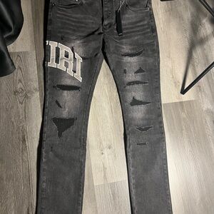 AMIRI Black Distressed Skinny Jeans
